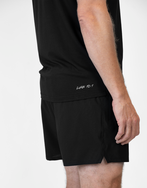 Rear view of man wearing Men's Black 6" Airflow Short
