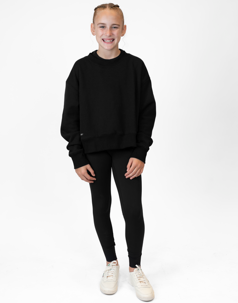 Girl wearing Ladies Black Relaxed Fleece Crew