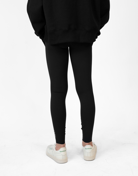 rear view of person wearing black Ladies Performance Legging