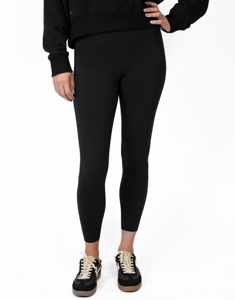 Person wearing black Ladies Performance Legging