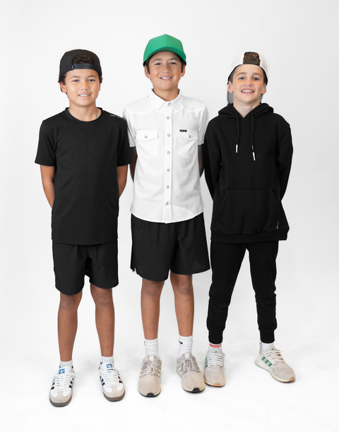 Group of boys with one Boy wearing Youth White S/S Pearl Snap Shirt