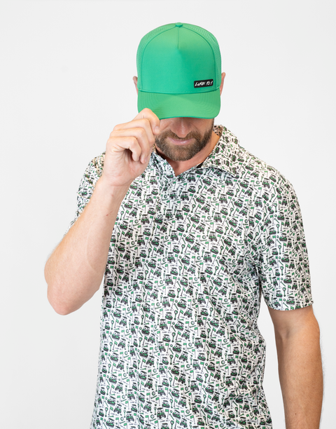 Man wearing kelly green hat with "LUKE 18:1" text