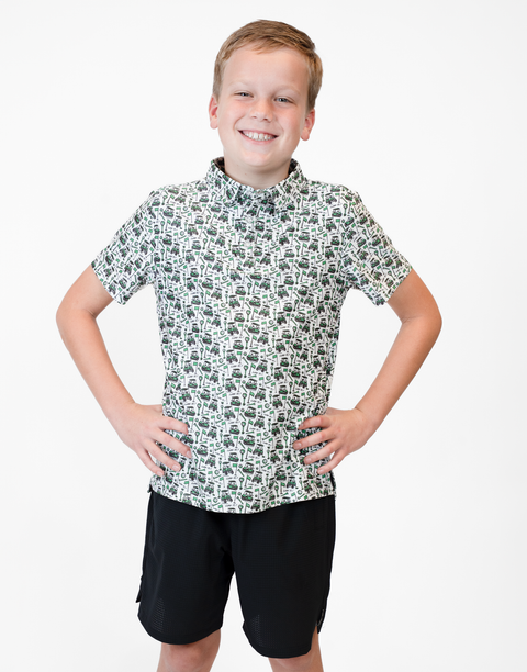 Boy wearing Youth Performance Golf Polo