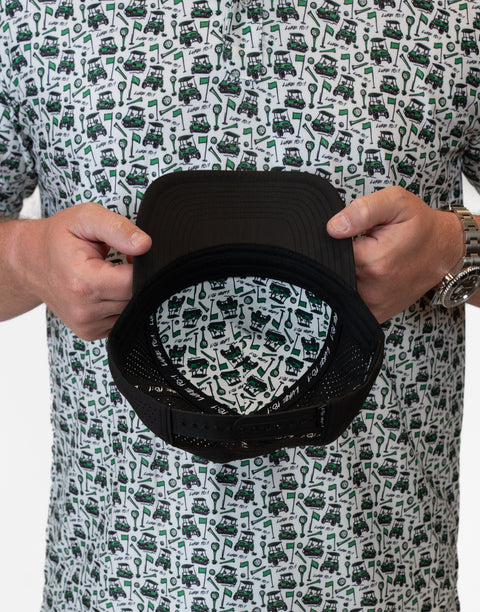 inside view of black hat showing pattern and "LUKE 18:1" text on interior