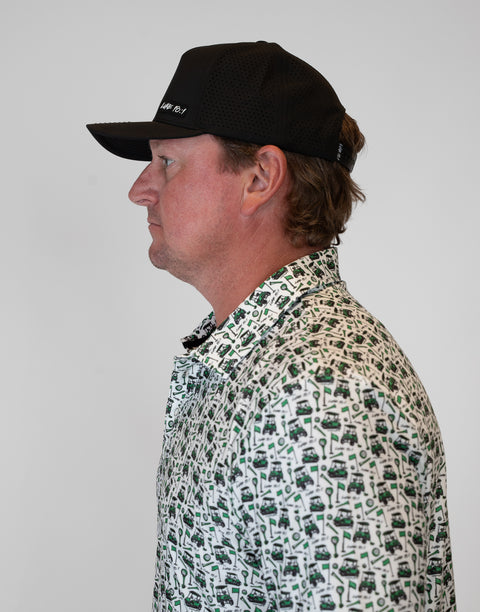 side view of man wearing black hat with "LUKE 18:1" text