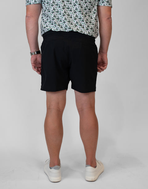 rear view of man wearing Men's Black 6" Airflow Short