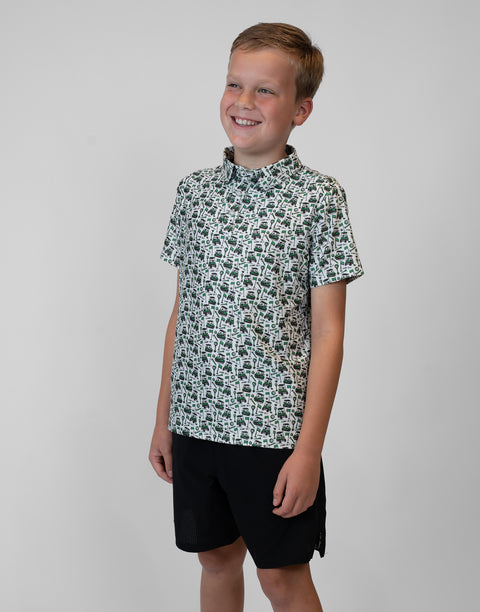 Boy wearing Youth Performance Golf Polo