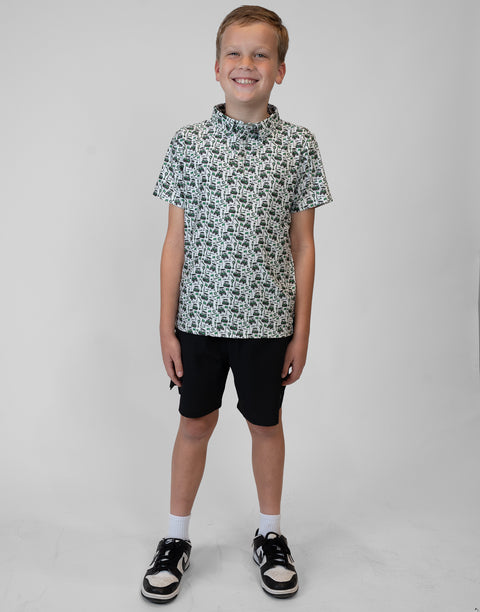 Boy wearing Youth Performance Golf Polo