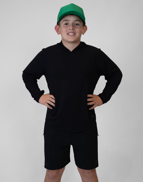 Boy wearing Youth Black Bamboo Performance Hoodie