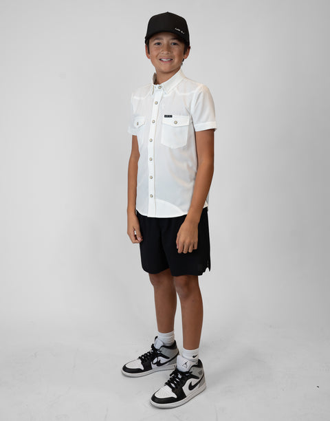 Boy wearing Youth White S/S Pearl Snap Shirt