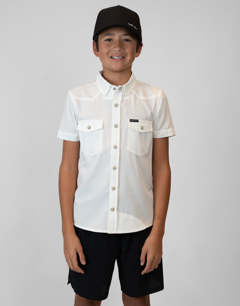 Boy wearing Youth White S/S Pearl Snap Shirt