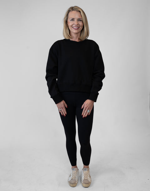 Woman wearing Ladies Black Relaxed Fleece Crew