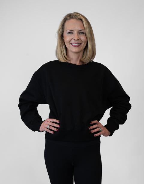 Woman wearing Ladies Black Relaxed Fleece Crew