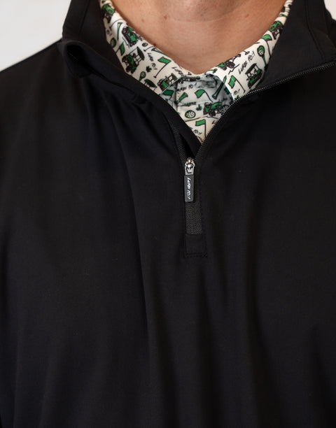 Closeup of Man wearing Men's black Performance 1/4-Zip with "LUKE 18:1" on zipper pull