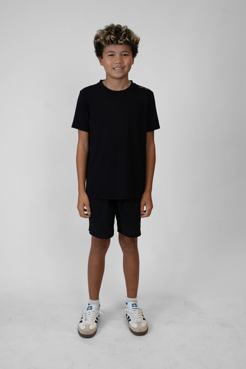 Boy wearing Youth Black Airflow Shorts