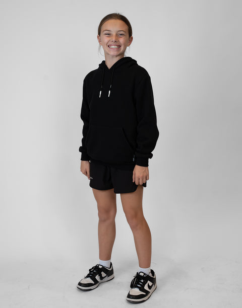 Girl wearing Youth Black Fleece Hoodie