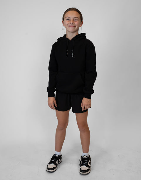 Girl wearing Youth Black Fleece Hoodie