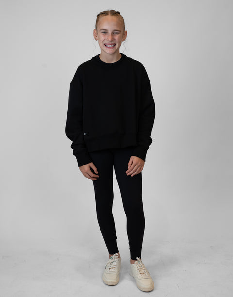 Girl wearing Ladies Black Relaxed Fleece Crew