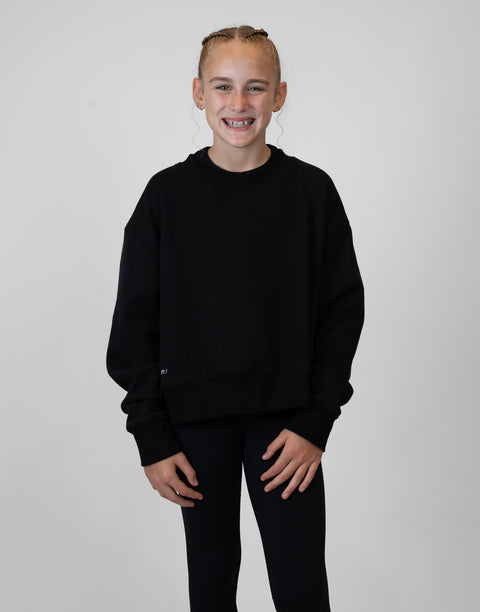 Girl wearing Ladies Black Relaxed Fleece Crew