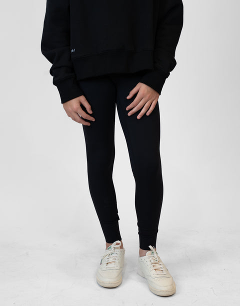 front view of person wearing black Ladies Performance Legging