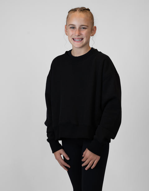 Girl wearing Ladies Black Relaxed Fleece Crew