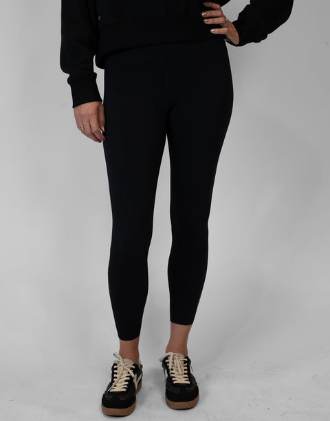 Person wearing black Ladies Performance Legging