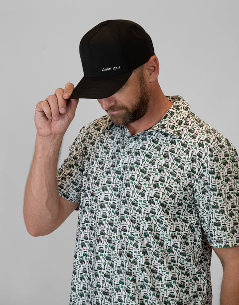 Man wearing black hat with "LUKE 18:1" text