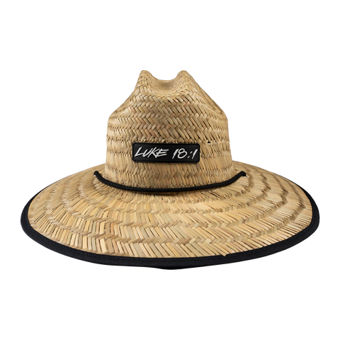 Straw hat with "LUKE 18:1" patch on front